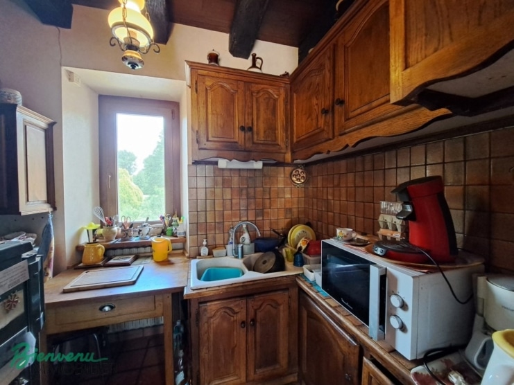 MAISON EN PIERRE CONSTRUITE DANS UN ANCIEN MOULIN